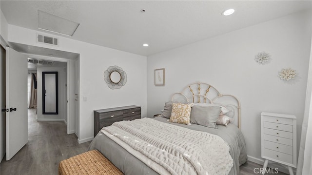 bedroom featuring hardwood / wood-style floors