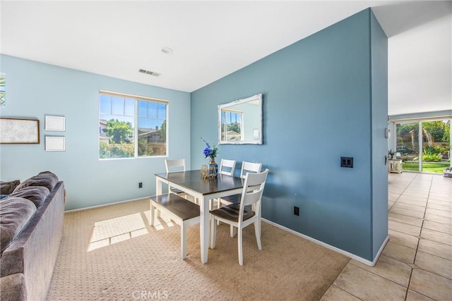 dining room featuring light tile patterned floors