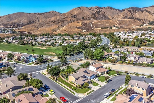 birds eye view of property featuring a mountain view