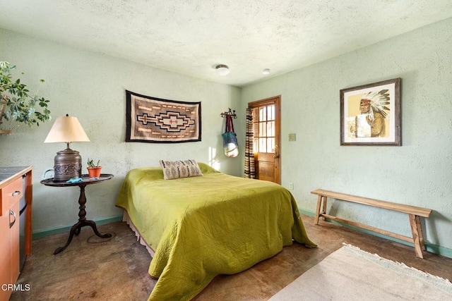 bedroom featuring a textured ceiling