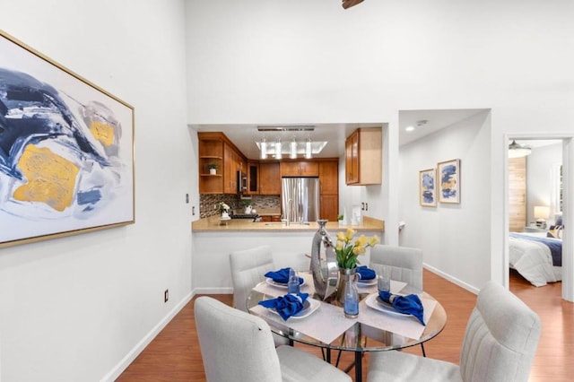 dining room featuring light hardwood / wood-style flooring