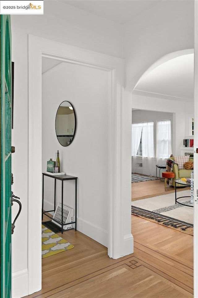 entrance foyer featuring parquet flooring