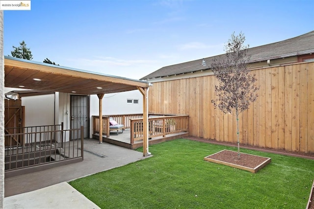 view of yard with a deck