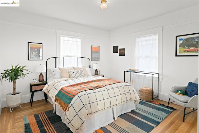 bedroom featuring light wood-type flooring