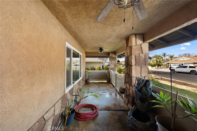 view of patio with ceiling fan