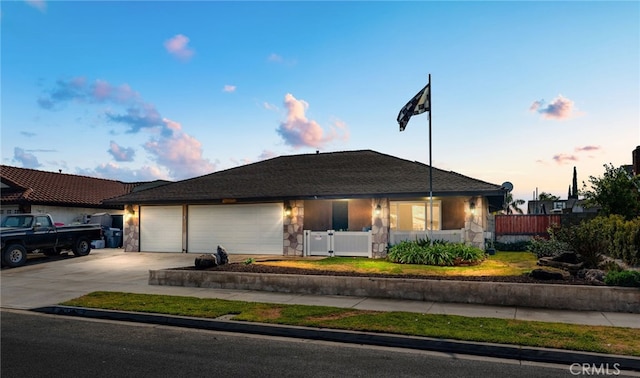 ranch-style home with a garage