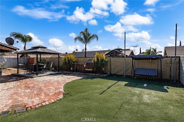 view of yard with a gazebo and a patio