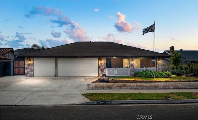 ranch-style home with a garage