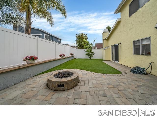 view of patio / terrace featuring a fire pit