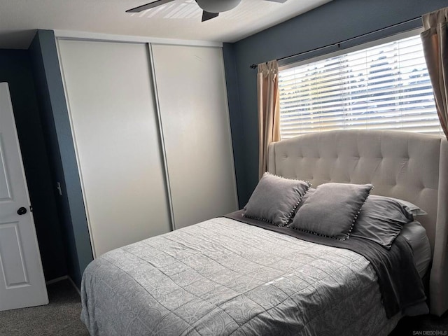 bedroom with carpet flooring, ceiling fan, and a closet