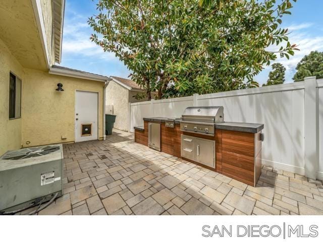 view of patio / terrace with area for grilling