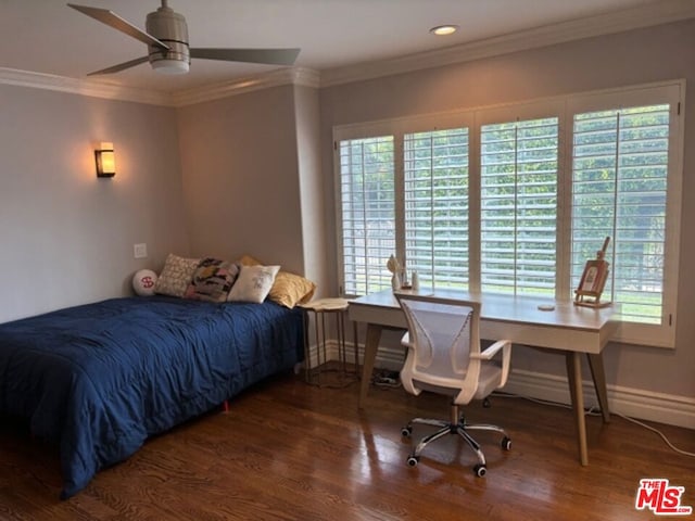 bedroom with ornamental molding, dark wood-type flooring, and ceiling fan