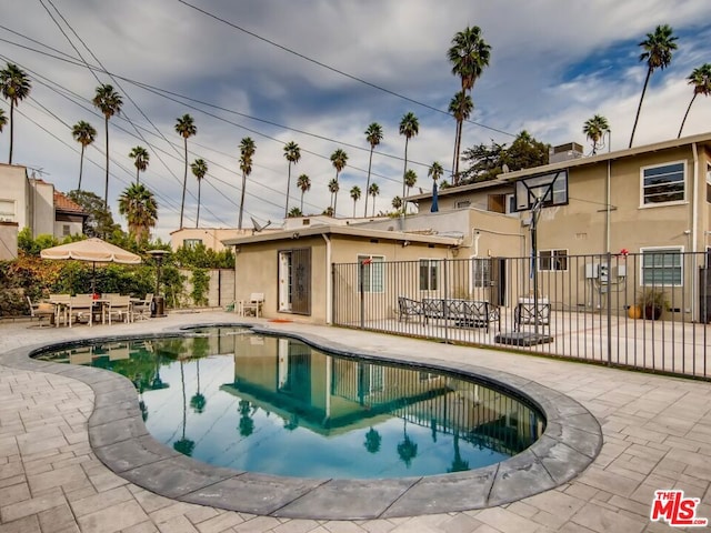 view of pool featuring a patio area