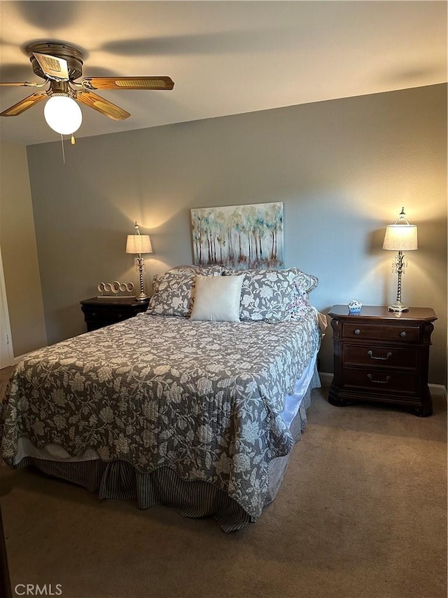 carpeted bedroom featuring ceiling fan