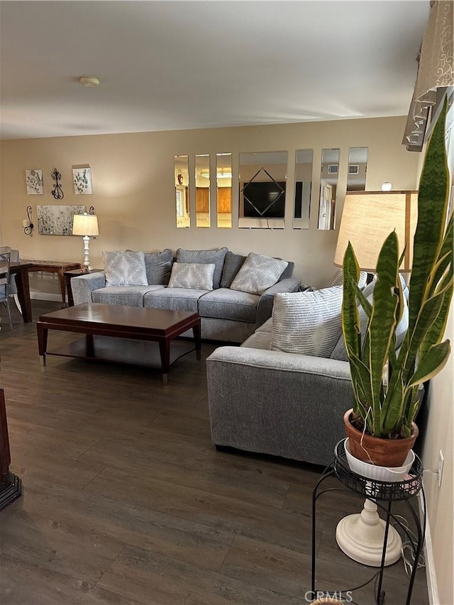 living room featuring dark hardwood / wood-style floors