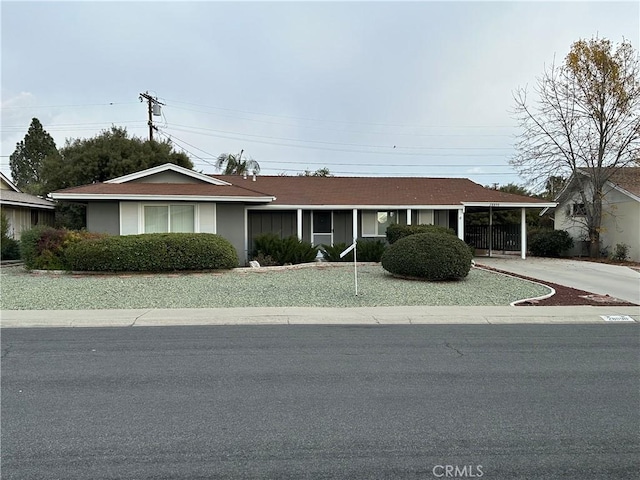 single story home with a carport