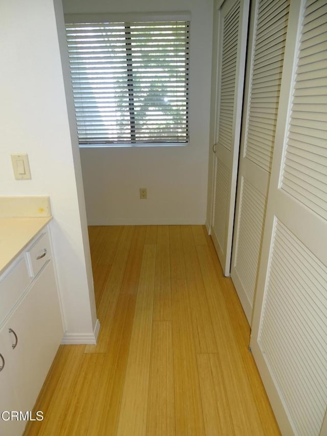 hallway featuring light wood-type flooring