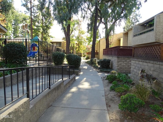 view of home's community with a playground