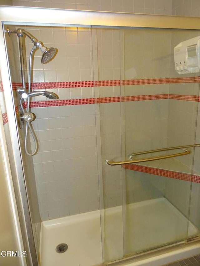 bathroom with an enclosed shower