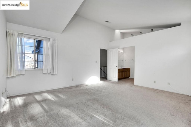 interior space featuring high vaulted ceiling