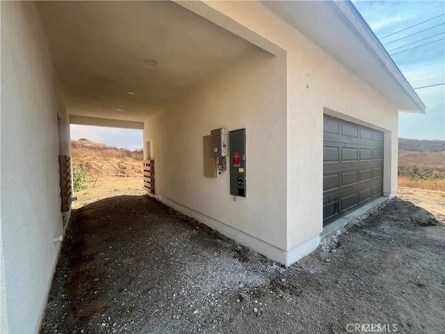 view of home's exterior with a garage