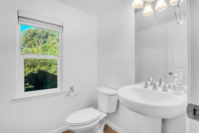 bathroom with sink and toilet