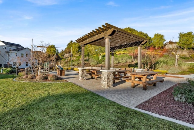 surrounding community featuring a patio, a yard, and a pergola