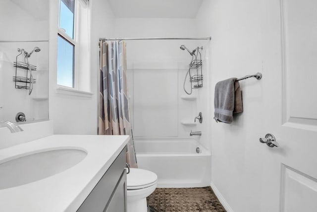 full bathroom with vanity, shower / bath combination with curtain, and toilet