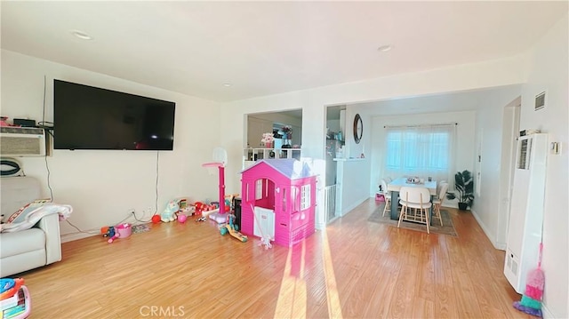 playroom featuring hardwood / wood-style floors