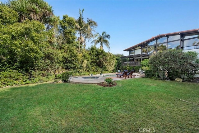 view of yard featuring a lanai