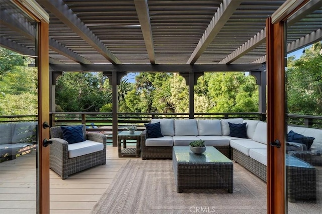 exterior space featuring french doors, an outdoor hangout area, and a pergola