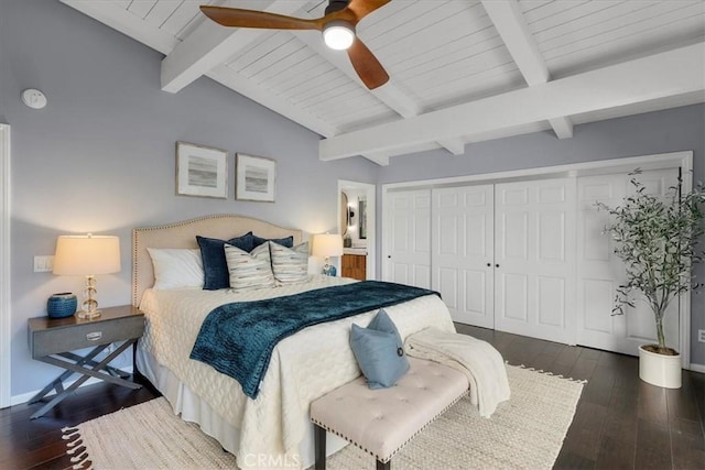 bedroom with dark hardwood / wood-style flooring, vaulted ceiling with beams, a closet, and ceiling fan