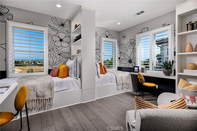 bedroom with wood-type flooring