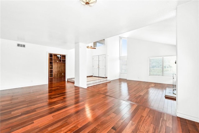 unfurnished living room featuring hardwood / wood-style flooring