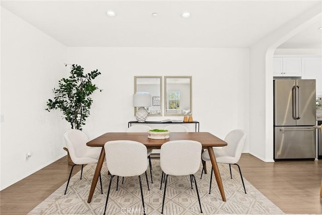 dining room with light hardwood / wood-style floors