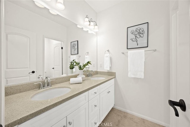 bathroom featuring vanity and tile patterned flooring