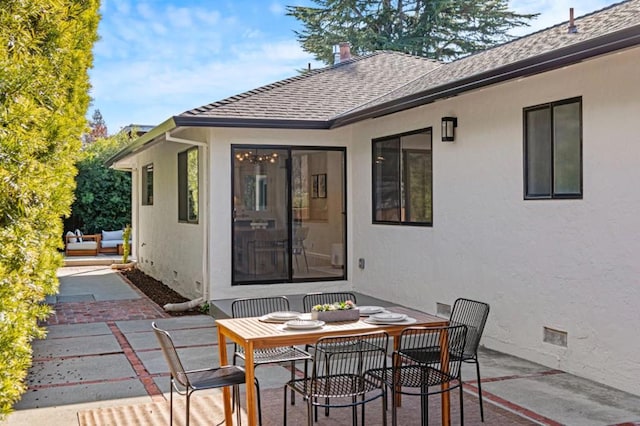 rear view of house featuring a patio area