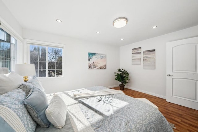 bedroom featuring dark wood-type flooring