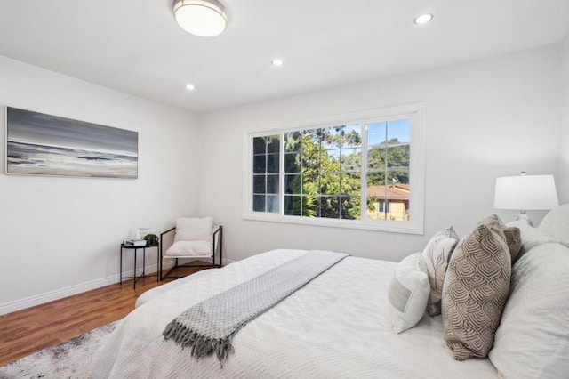 bedroom featuring wood-type flooring