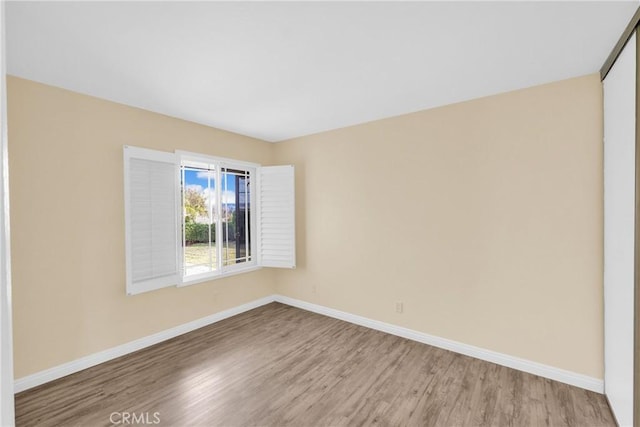 empty room with light wood-type flooring