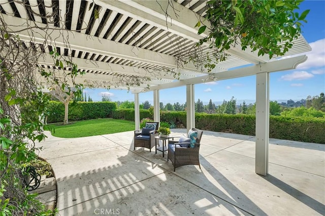 view of patio featuring an outdoor hangout area and a pergola