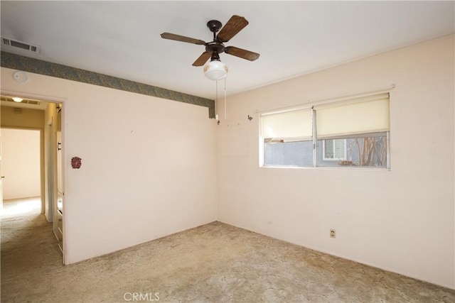 empty room featuring ceiling fan