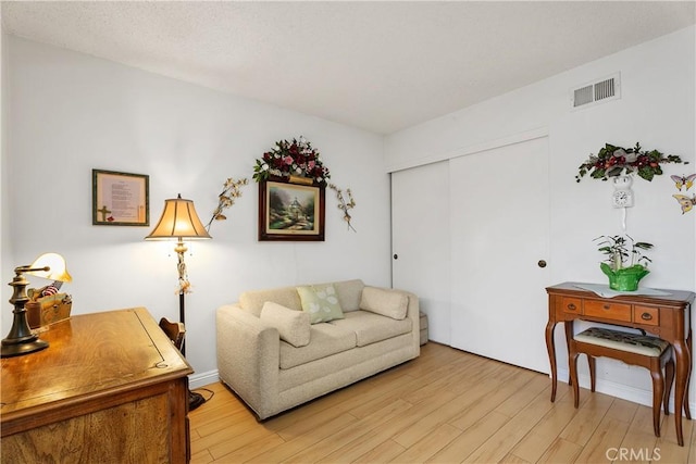 living room featuring light hardwood / wood-style floors