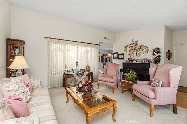 living room featuring light carpet