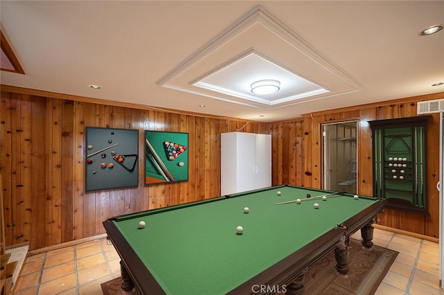 rec room with pool table and wooden walls