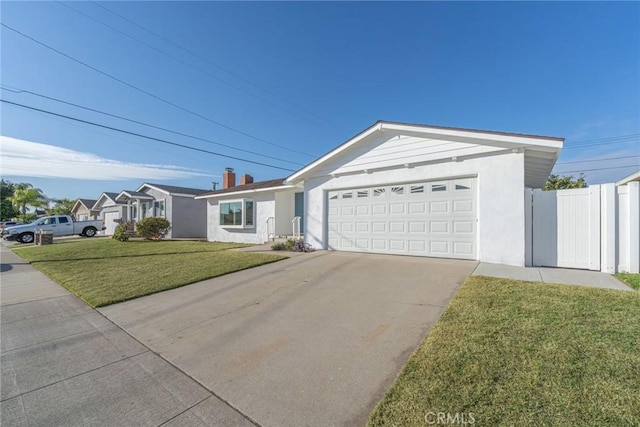 single story home featuring a garage and a front lawn