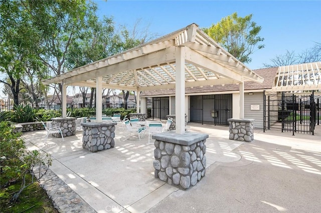 view of patio featuring a swimming pool