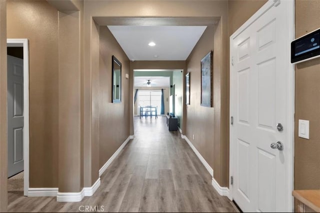 hallway featuring light hardwood / wood-style flooring