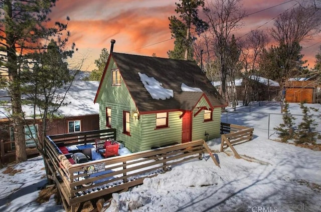 view of snow covered property