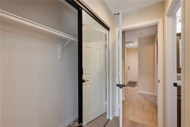 closet featuring visible vents